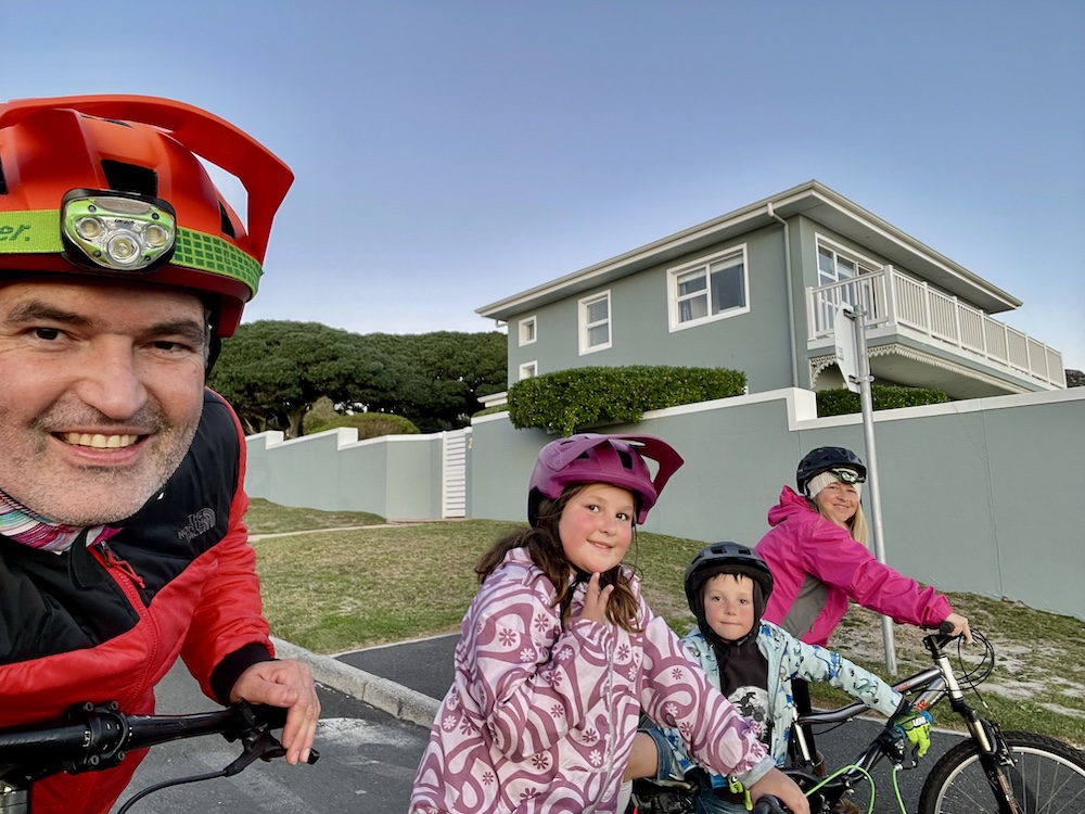 Hex Novoa with family on a bike ride